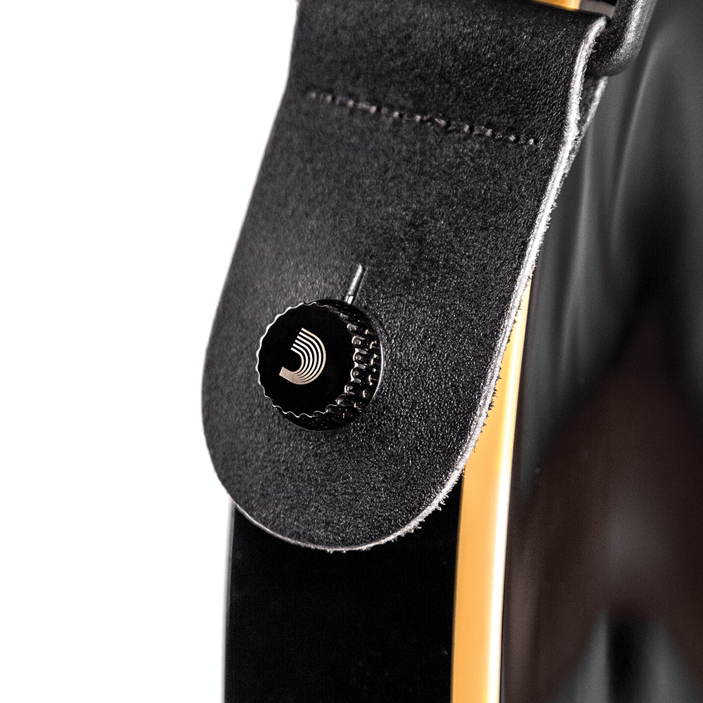 D'Addario Universal Strap Lock System black, fitted to a strap
